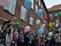 Children of the "Den Classenske Legat Skole" with coulourful balloons Children of the "Den Classenske Legat Skole" with balloons