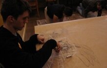 Lukasz while painting at an art therapy workshop