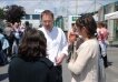 Eric Magnier being interviewed by two women